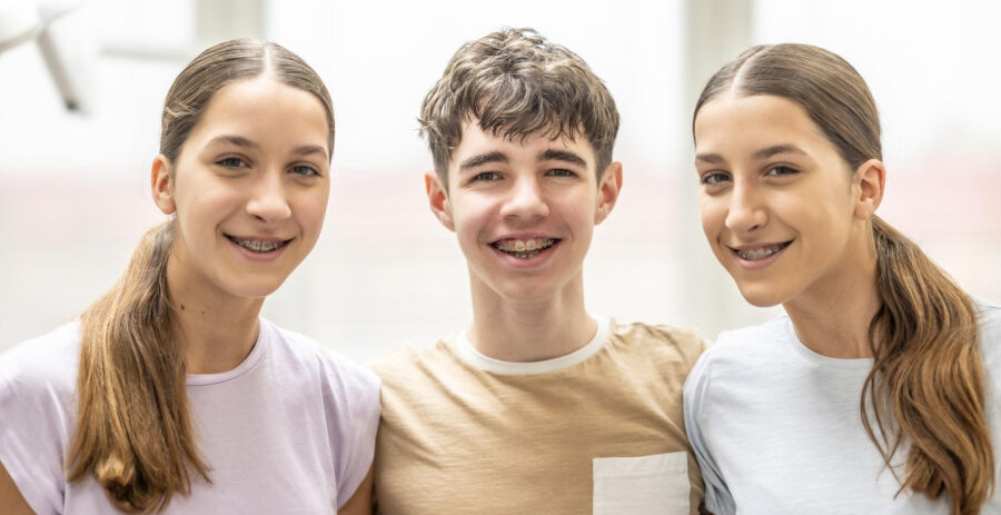 Neal Smiles patient with a confident smile